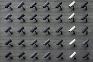 Commercial security camera installation on an office building exterior